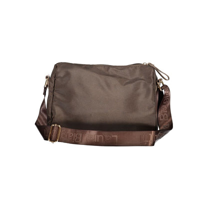 This Handbag by Laura Biagiotti for women in polyester and brown presents a sculptural silhouette featuring a secure zipper, ample external-pockets & internal-pockets, and versatile shoulder-strap & adjustable-strap for a sculptural finish.