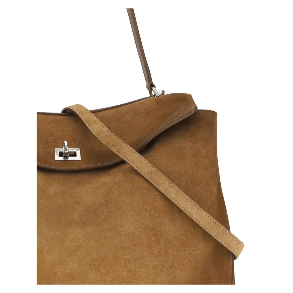 Medium Shoulder Bag by Balenciaga for women in bos taurus suede calfskin leather brown, silver & signature features a enviable silhouette, showcasing a secure zipper, ample external-pockets, and enviable shoulder-strap, handle & detachable-strap for a enviable finish.