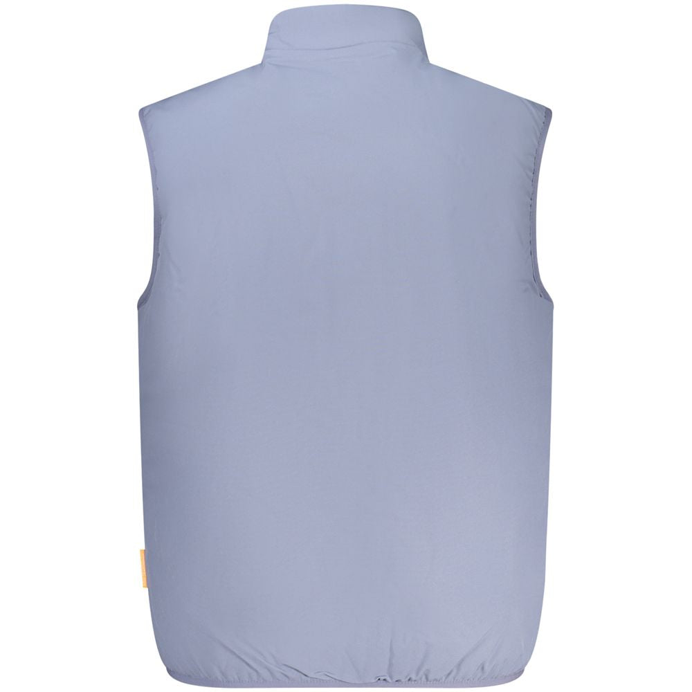 Vest by Norway 1963 for men in stretch polyester blue showcases a utilitarian silhouette, artfully incorporating pockets and a utilitarian for a truly utilitarian finish.