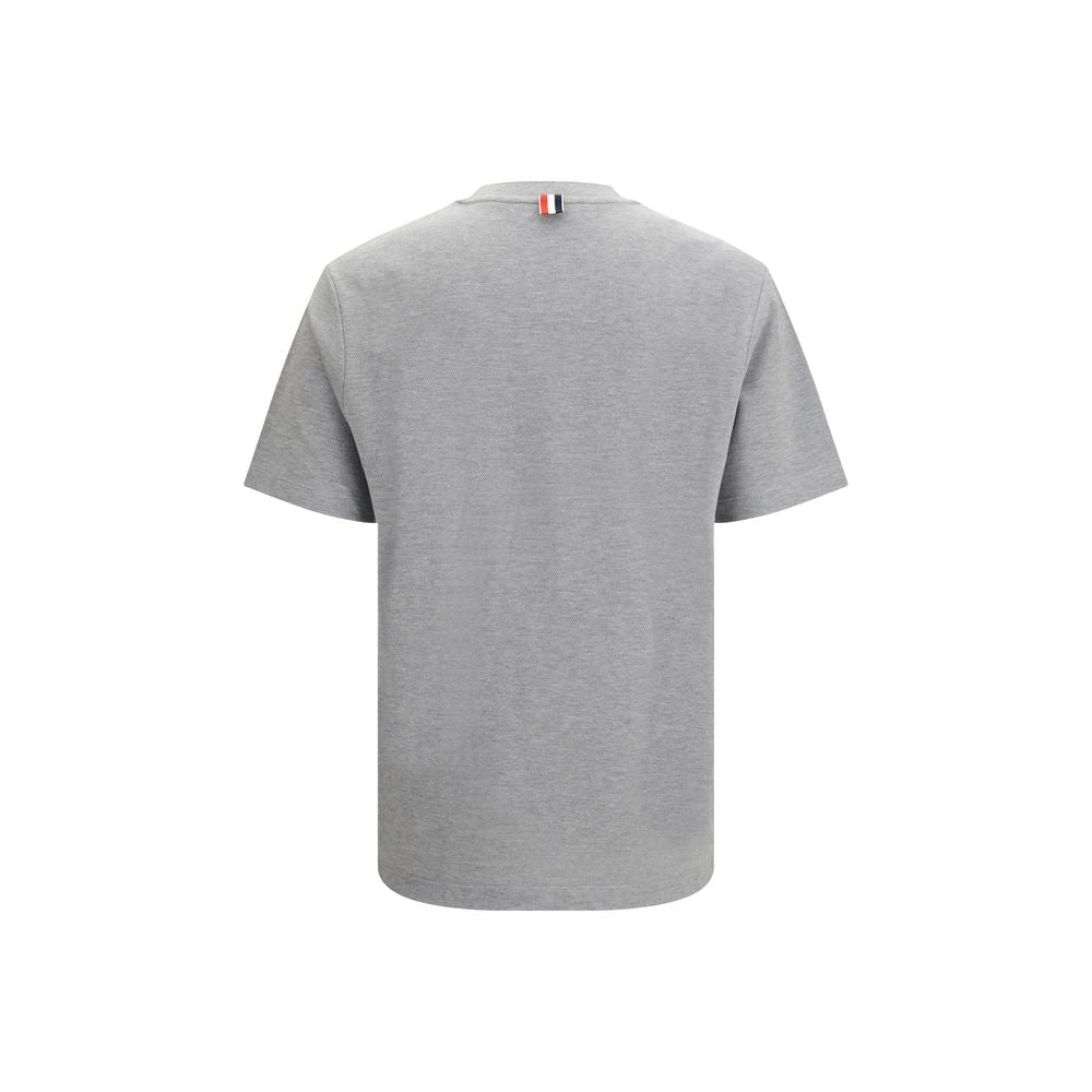 T-Shirt by Thom Browne for men in cotton gray & signature showcases a dramatic silhouette, elegantly detailed with a dramatic crew neckline and for a truly dramatic finish.