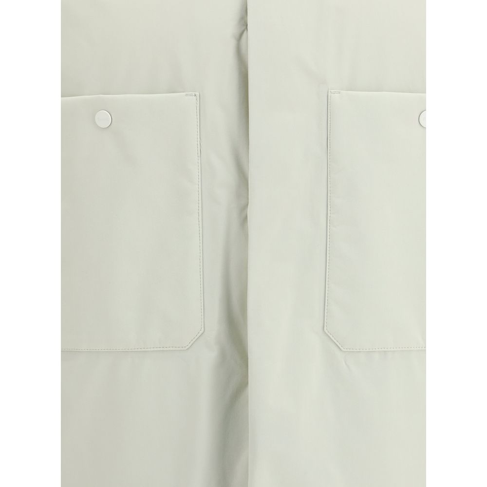 Overcoat by LAMINAR for men in nylon cream & ivory features a cosy chic silhouette, artfully detailed with a sophisticated and premium pockets & insulated for a cosy chic finish.