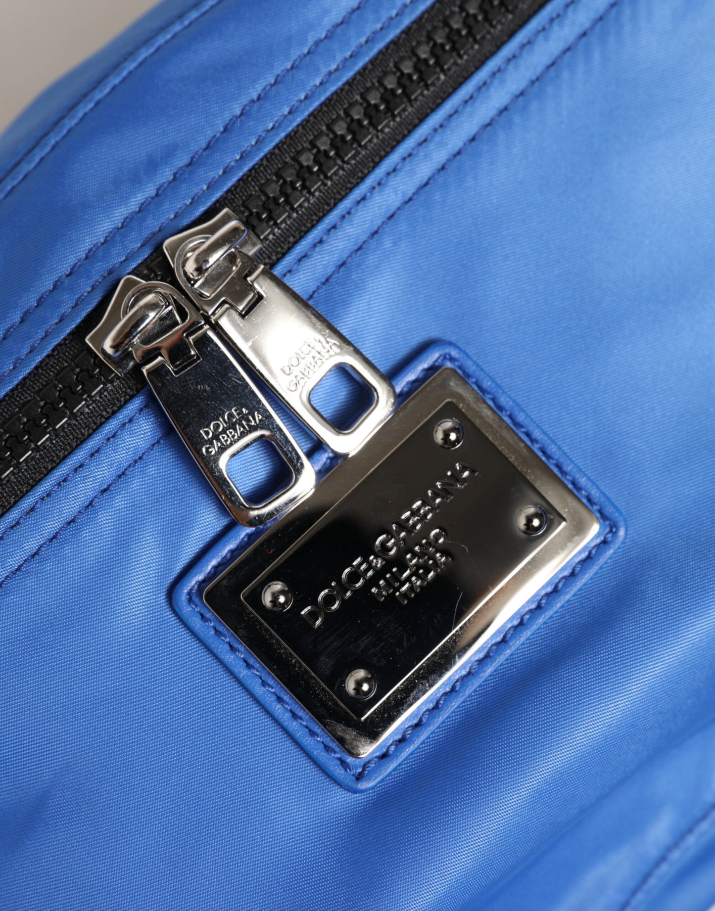 Fanny Pack Belt Bag by Dolce & Gabbana for men in calf leather & polyamide blue presents a unrivaled Calf Leather Polyamide Fanny Pack Belt Bag design, featuring a secure zipper, ample built-in-compartments, and versatile adjustable-strap & belt-strap for a unrivaled finish.