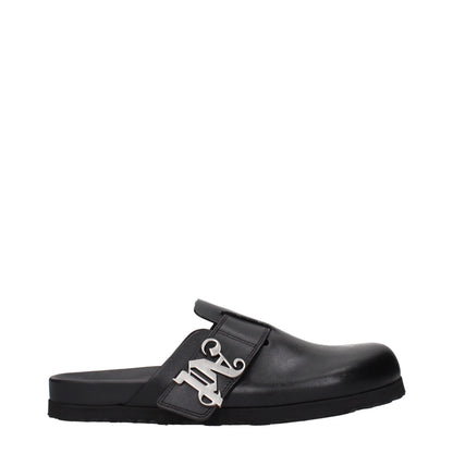 Clogs Slippers by Palm Angels for men in leather black presents a sumptuous silhouette, perfectly capturing the sumptuous essence of Men's Leather Clogs Slippers with its signature and .