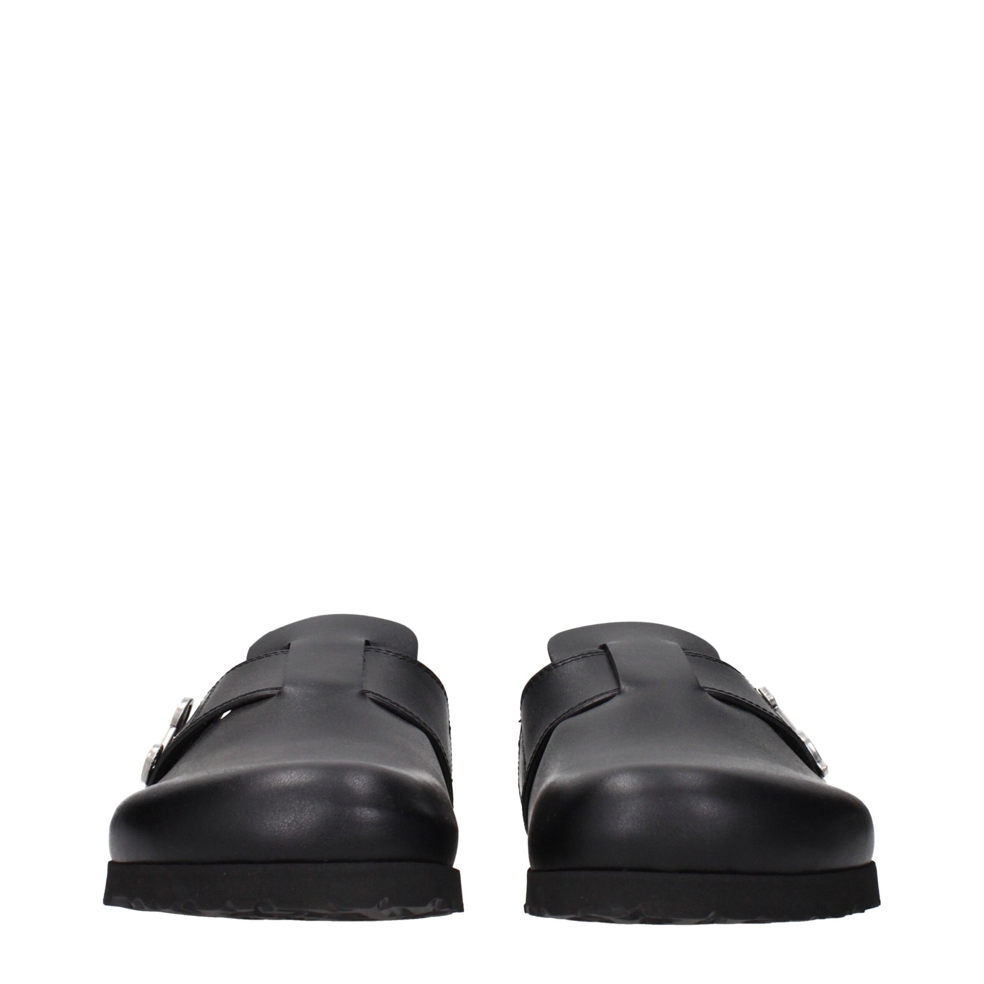 Clogs Slippers by Palm Angels for men in leather and black presents a sculptural silhouette as Men's Leather Clogs Slippers, featuring a sculptural and a sculptural for refined comfort.