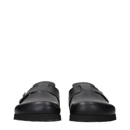 Clogs Slippers by Palm Angels for men in leather and black presents a sculptural silhouette as Men's Leather Clogs Slippers, featuring a sculptural and a sculptural for refined comfort.