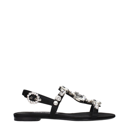 Flat Sandals by Dolce & Gabbana for women in satin & rhinestone black features an architectural design from the Women's Satin & Rhinestone Flat Sandals collection, defined by a architectural flat and for a architectural finish.