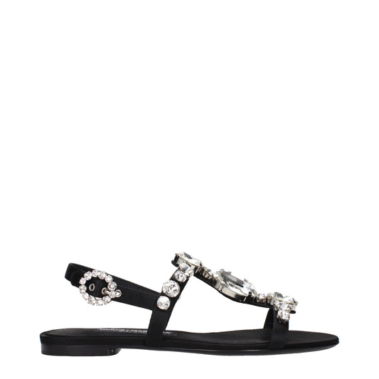Flat Sandals by Dolce & Gabbana for women in satin & rhinestone black features an architectural design from the Women's Satin & Rhinestone Flat Sandals collection, defined by a architectural flat and for a architectural finish.