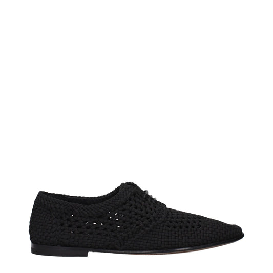 Flat Lace-Up Shoes by Dolce & Gabbana for men in leather black features an effortless chic silhouette, showcasing the Men's Leather Flat Lace-Up Shoes design with an effortless chic flat and a round toe style for a effortless chic look.