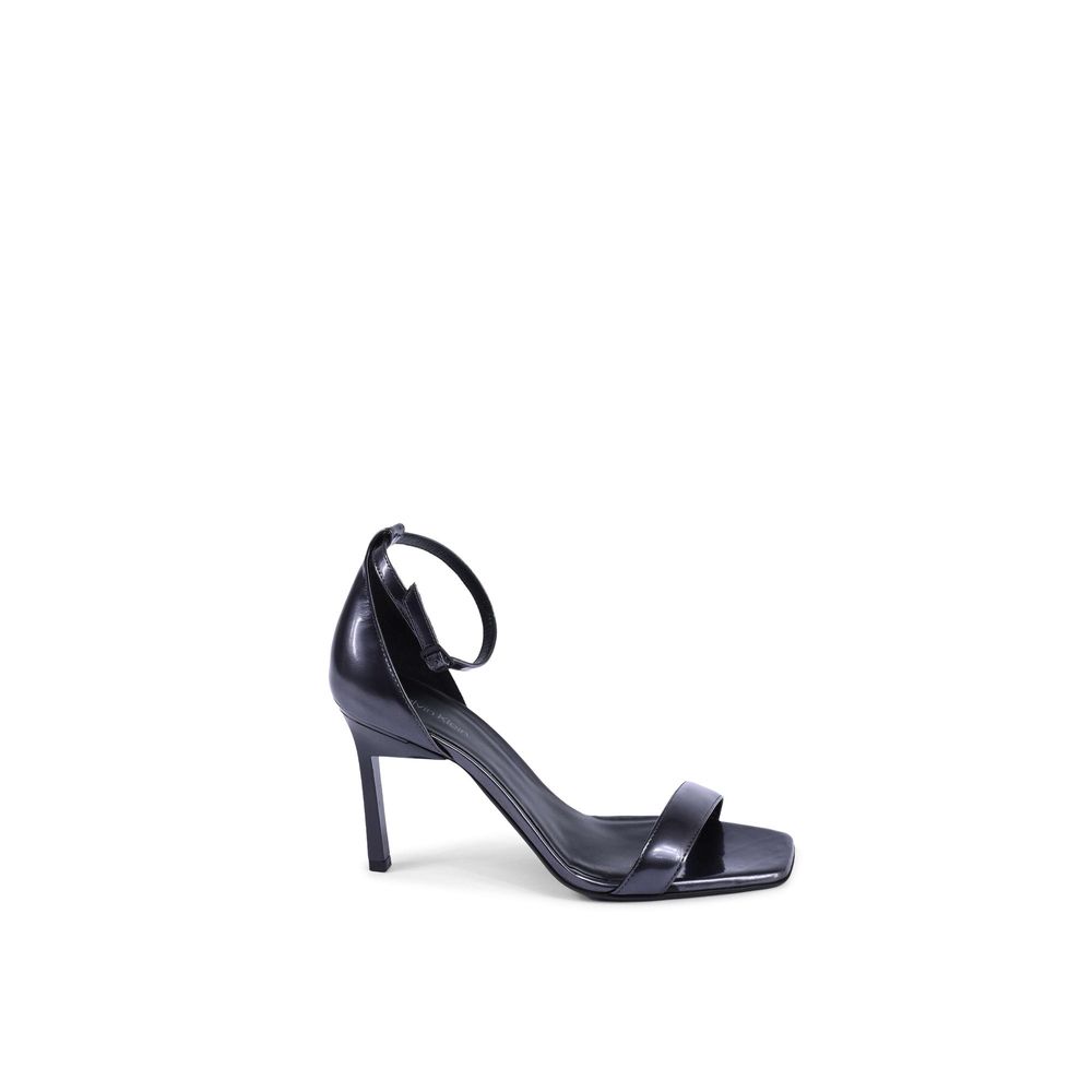 Stiletto Sandals by Calvin Klein for women in leather and black presents a captivating silhouette, showcasing the signature style of the Women's Leather Stiletto Sandals with a captivating stiletto and captivating .