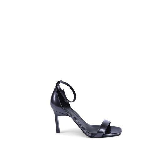 Stiletto Sandals by Calvin Klein for women in leather and black presents a captivating silhouette, showcasing the signature style of the Women's Leather Stiletto Sandals with a captivating stiletto and captivating .