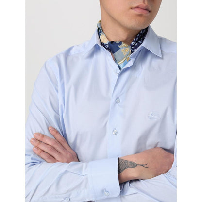 Scarf by Etro for men in silk blue presents a cosy silhouette, artfully capturing the sophisticated design and premium aesthetic of the Silk Scarf.