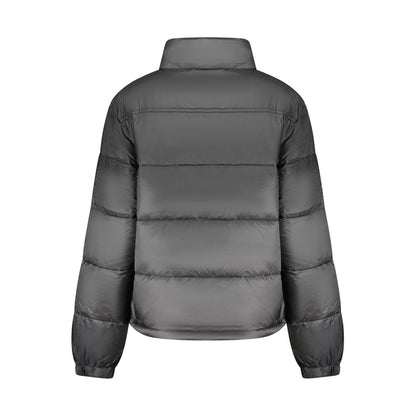 Windbreaker Jacket by Tommy Hilfiger for women in polyester black features an perennial silhouette with a refined and perennial pockets & windproof for a sophisticated weather-resistant look.