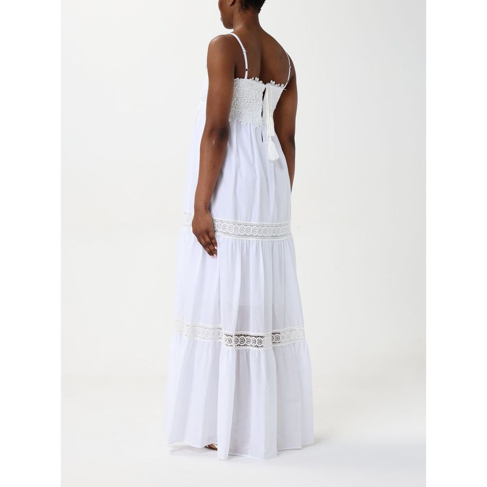 Dress by Kaos for women in cotton white showcases a striking silhouette, elegantly detailed with a , refined , and a striking long for a striking finish.