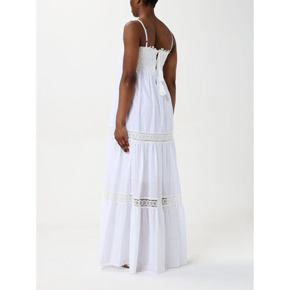 Dress by Kaos for women in cotton white showcases a striking silhouette, elegantly detailed with a , refined , and a striking long for a striking finish.