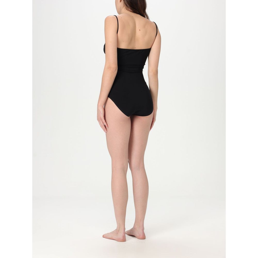 One-Piece Swimsuit by Norma Kamali for women in nylon & spandex black features a exquisite silhouette, showcasing the exquisite design of this Women's Nylon & Spandex One-Piece Swimsuit with a exquisite fit and cut.
