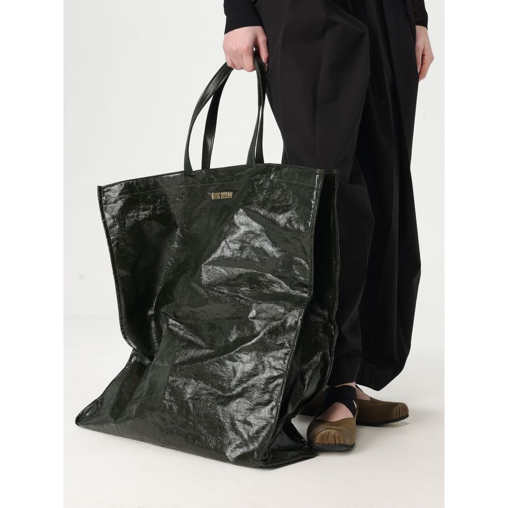 This Shoulder Handbag by Uma Wang for women in nylon and green presents a sculptural silhouette featuring a secure , ample , and versatile shoulder-strap for a sculptural finish.