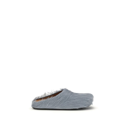 Flat Mule Mules Slip-On Shoes by Marni for men in bost taurus calf leather & fur light-blue showcases a timeless silhouette from the Men's Bost Taurus Calf Leather & Fur Flat Mule Mules Slip-On Shoes collection, featuring a timeless flat and for a timeless finish.