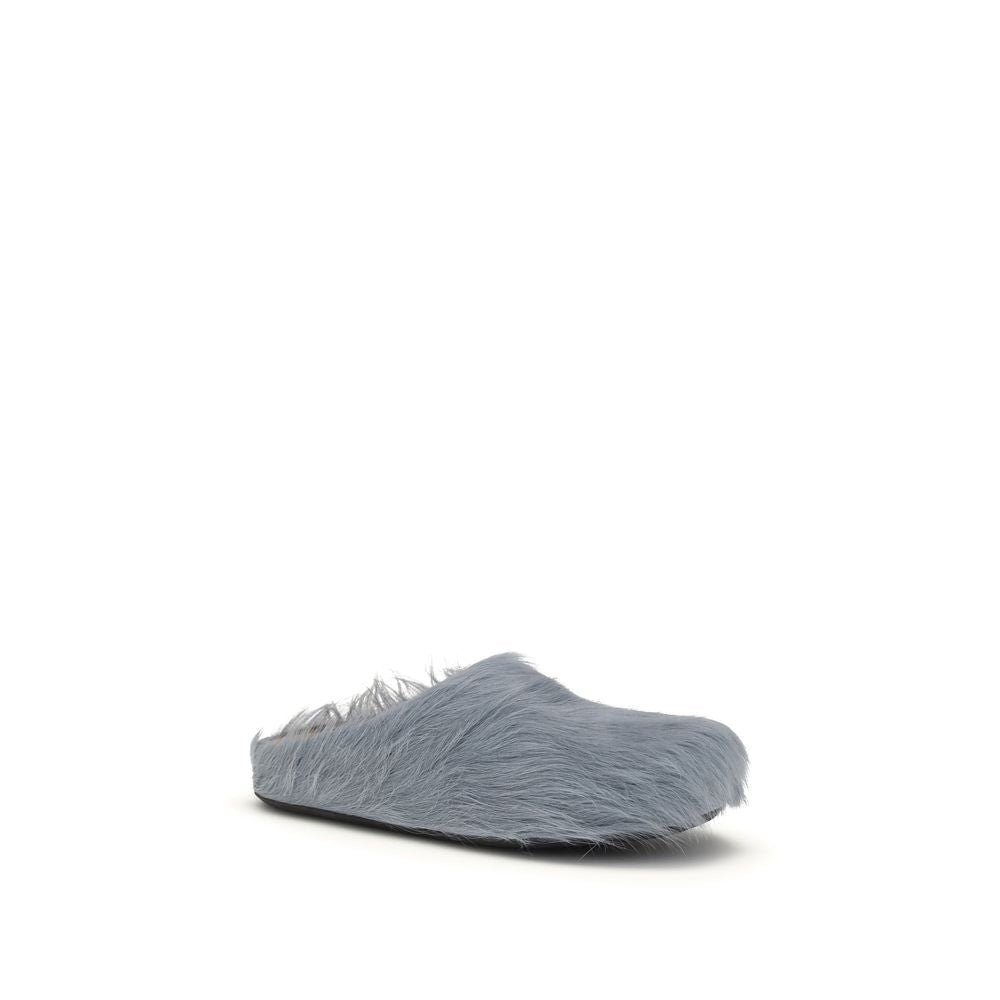 Flat Mule Mules Slip-On Shoes by Marni for men in bost taurus calf leather & fur light-blue features an dynamic silhouette from the Men's Bost Taurus Calf Leather & Fur Flat Mule Mules Slip-On Shoes collection, defined by a dynamic and flat for a dynamic look.