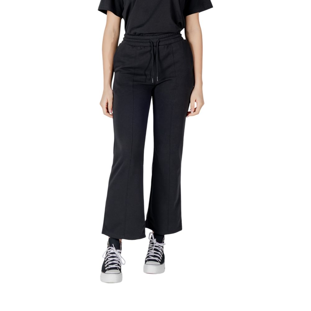 Activewear Jogger Pants by Converse for women in cotton polyester black features an sporty with a and long, showcasing sporty .