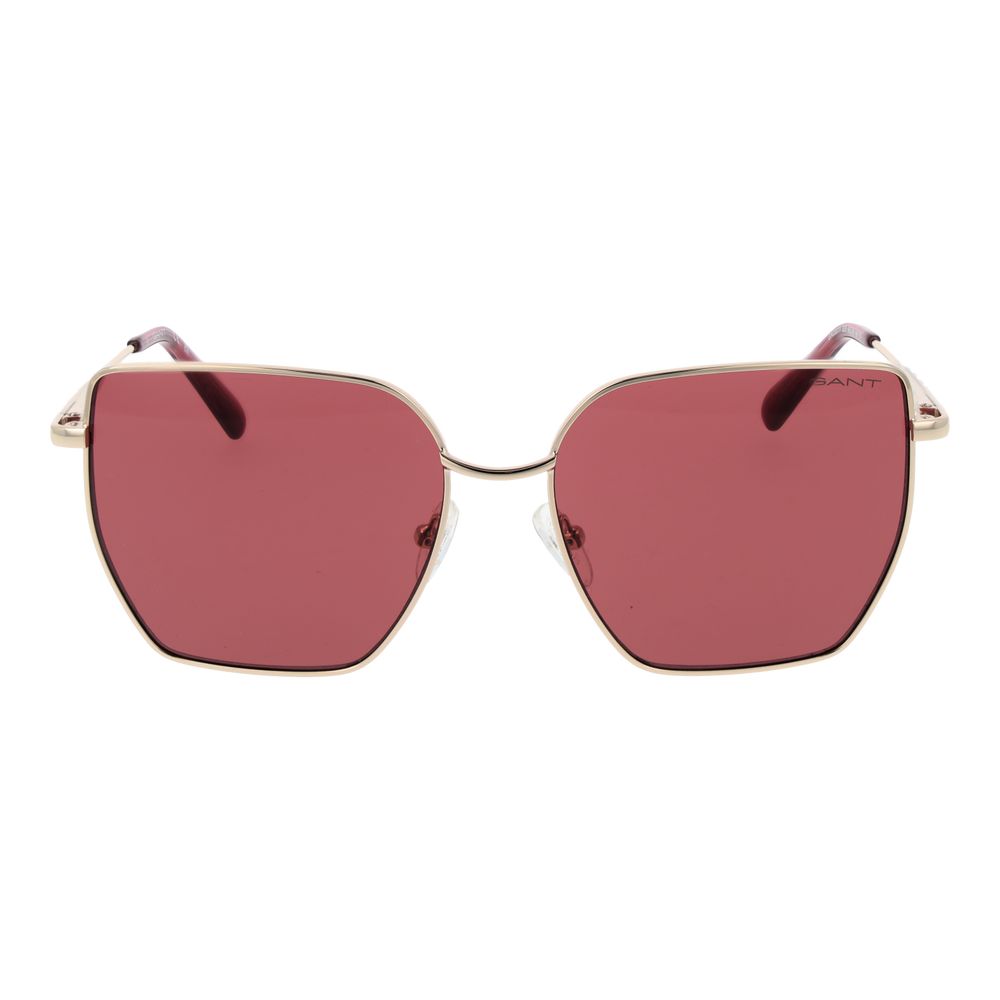 This Sunglasses by Gant for women in metal gold presents a sumptuous silhouette, showcasing a sumptuous full-rim square frame design in gold coloured frame and high-performance non-polarized category-3-dark-tint lens.