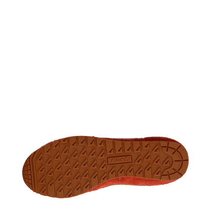 Sneakers by Autry for women in suede leather orange presents a impeccable silhouette as Women's Fashion Suede Leather Sneakers, expertly defined by a impeccable fashion style for a impeccable, high-fashion look.
