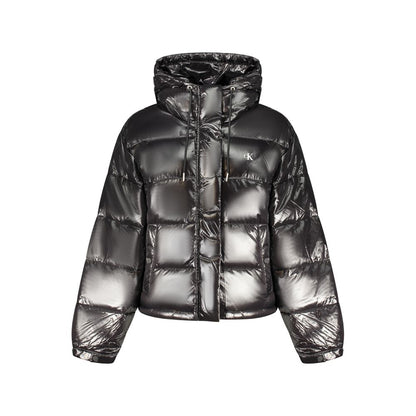 Hooded Windbreaker Jacket by Calvin Klein for women in polyester black & print presents a resilient silhouette, artfully detailed with a sophisticated hooded neckline and functional pockets, hooded & windproof for a resilient finish.