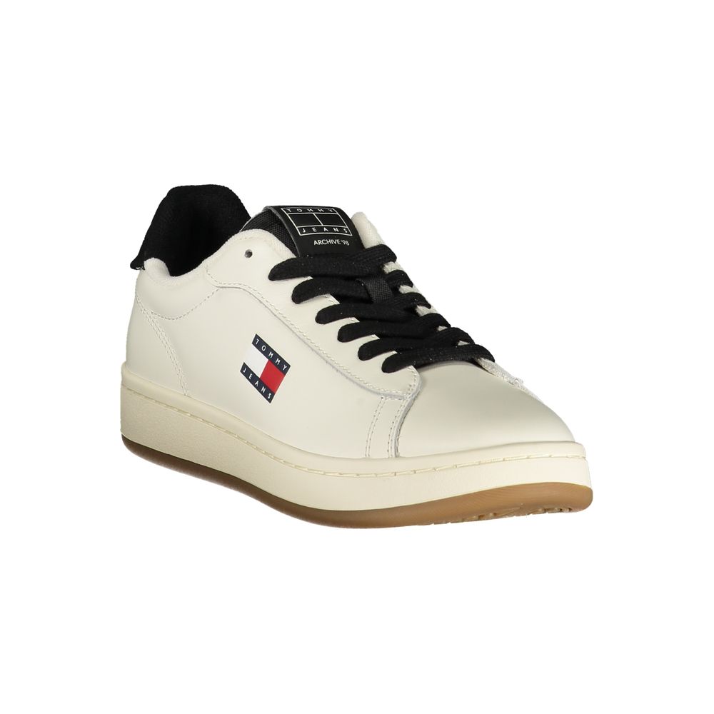 Sneakers by Tommy Hilfiger for women in polyester leather black, white & print presents a sumptuous silhouette from the Ecru Women's Low-Top Polyester Leather Sneakers collection, showcasing a sumptuous low-top style for an elevated aesthetic.