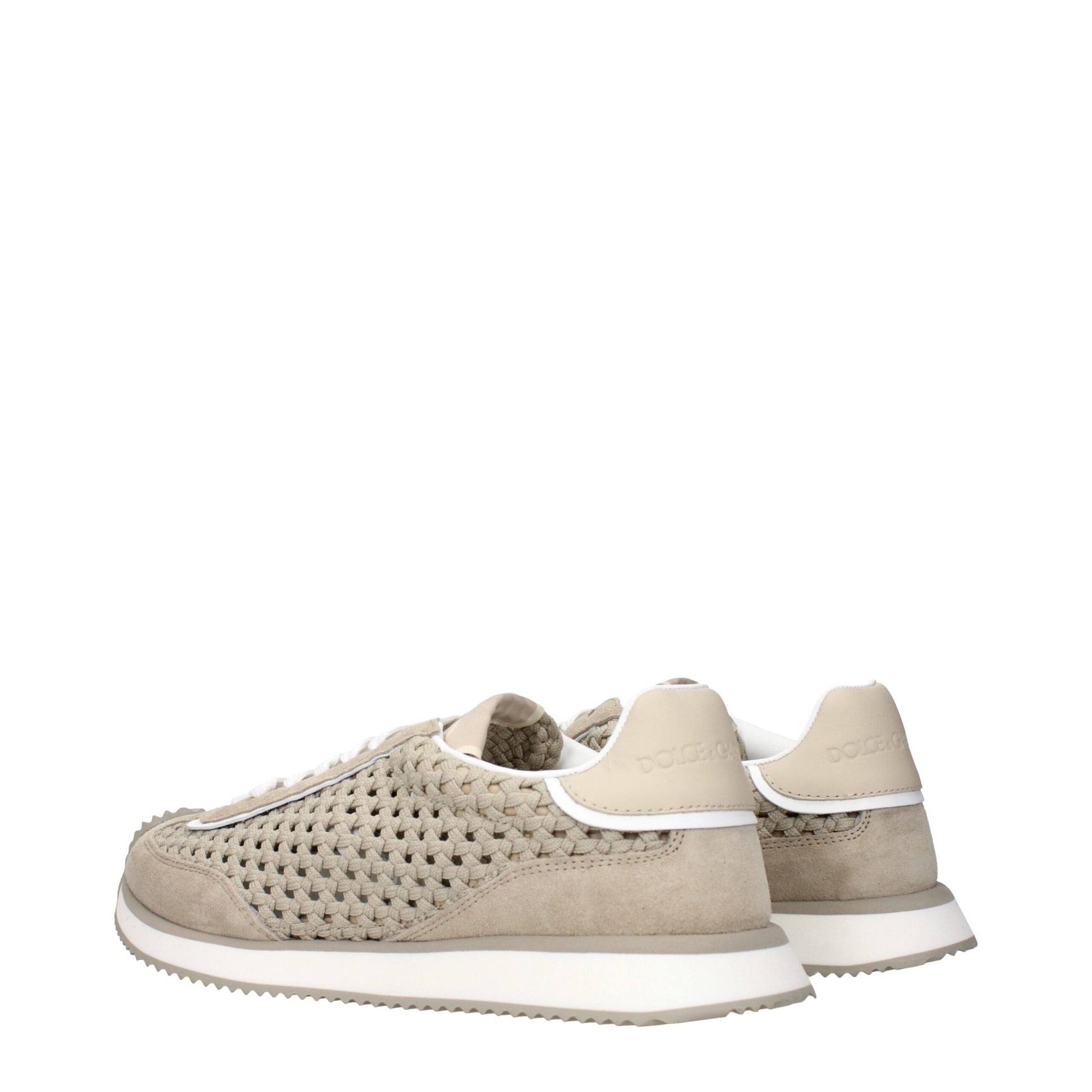 Sneakers by Dolce & Gabbana for men in fabric beige presents a sumptuous silhouette, artfully capturing the essence of the Men's Low Top Fabric Sneakers with its sumptuous low-top style design.