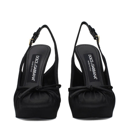 Very-High-Heel Sandals Pumps Heels by Dolce & Gabbana for women in leather & satin black & gold features a effortless chic silhouette, showcasing the Women's Leather & Satin Very-High-Heel Sandals Pumps Heels design with a effortless chic 13-cm-heel very-high-heel and round toe style for a effortless chic finish.