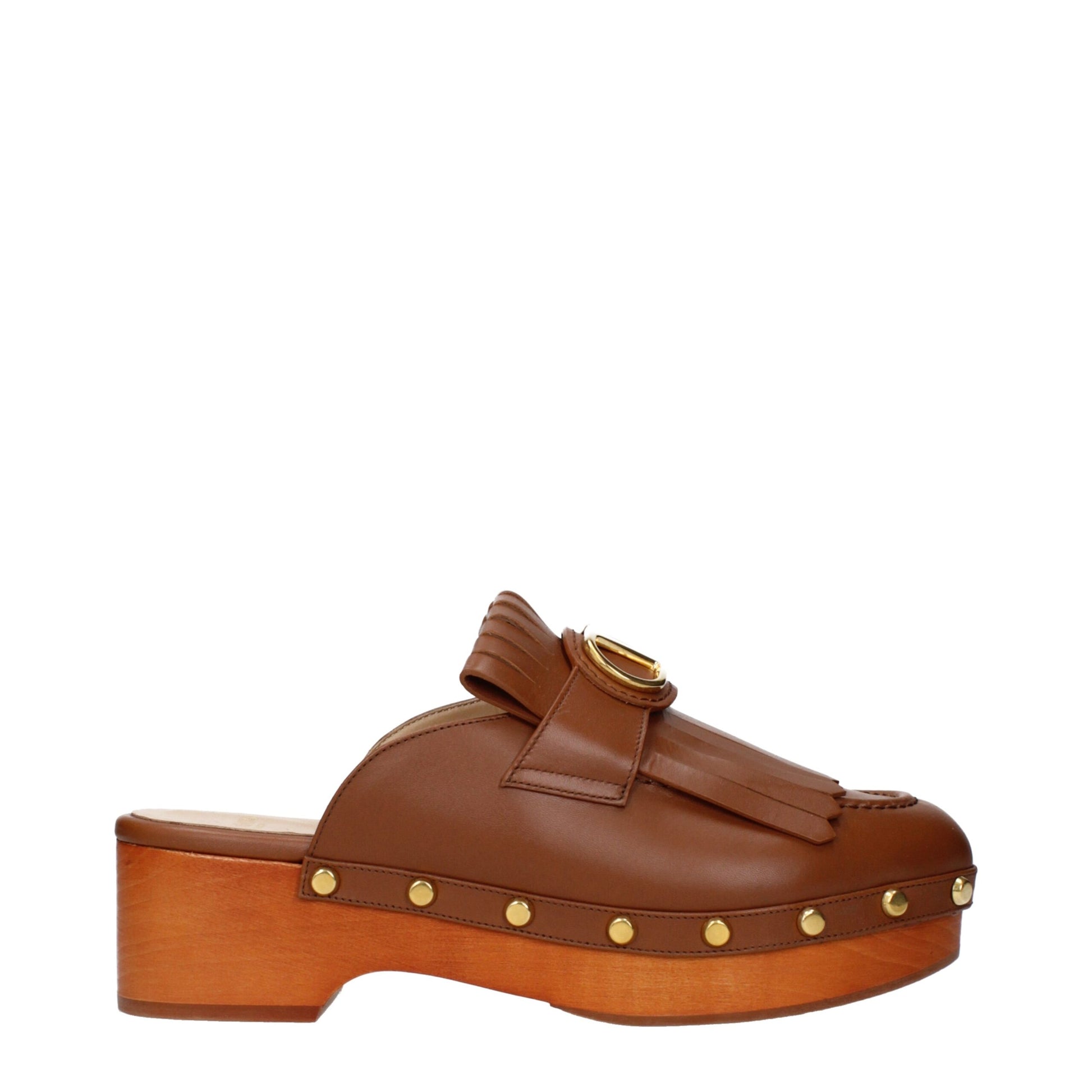 Clogs Slippers by Valentino Garavani for women in leather brown presents a effortless silhouette, showcasing the elegant Women's Leather Clogs Slippers design with its unique and sophisticated .