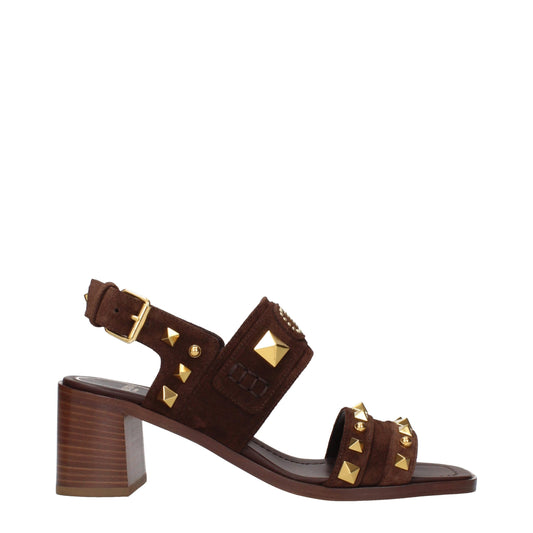 Sandals by Valentino Garavani for women in suede leather and brown presents a captivating silhouette, showcasing the signature style of the Women's Suede Leather Sandals with a captivating and captivating .