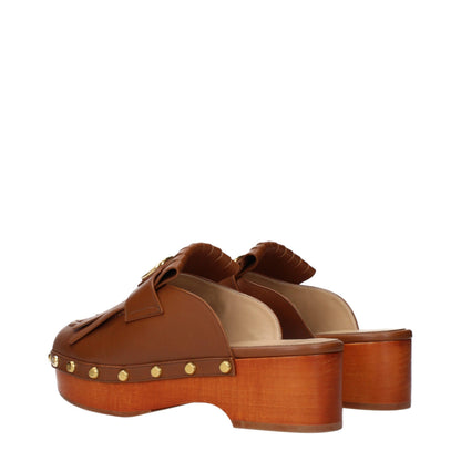 Clogs Slippers from Valentino Garavani for women in leather brown features a dynamic design from the Women's Leather Clogs Slippers collection, highlighting a with a and functional .