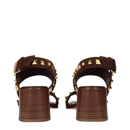 Sandals by Valentino Garavani for women in suede leather brown presents a sculptural silhouette, showcasing the Women's Suede Leather Sandals design with a sculptural and for a premium look.