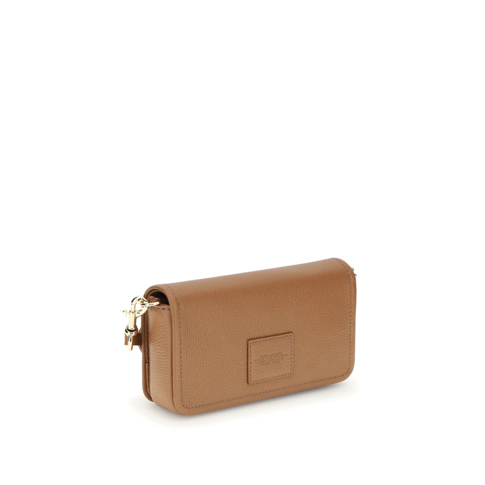 Mini Shoulder Flap Bag by Marc Jacobs for women in bos taurus calf grained leather brown, signature & monogram features a effortless sophistication silhouette, secured by a flap, magnetic & button with ample single-compartment and versatile shoulder-strap & adjustable-strap for a effortless sophistication finish.