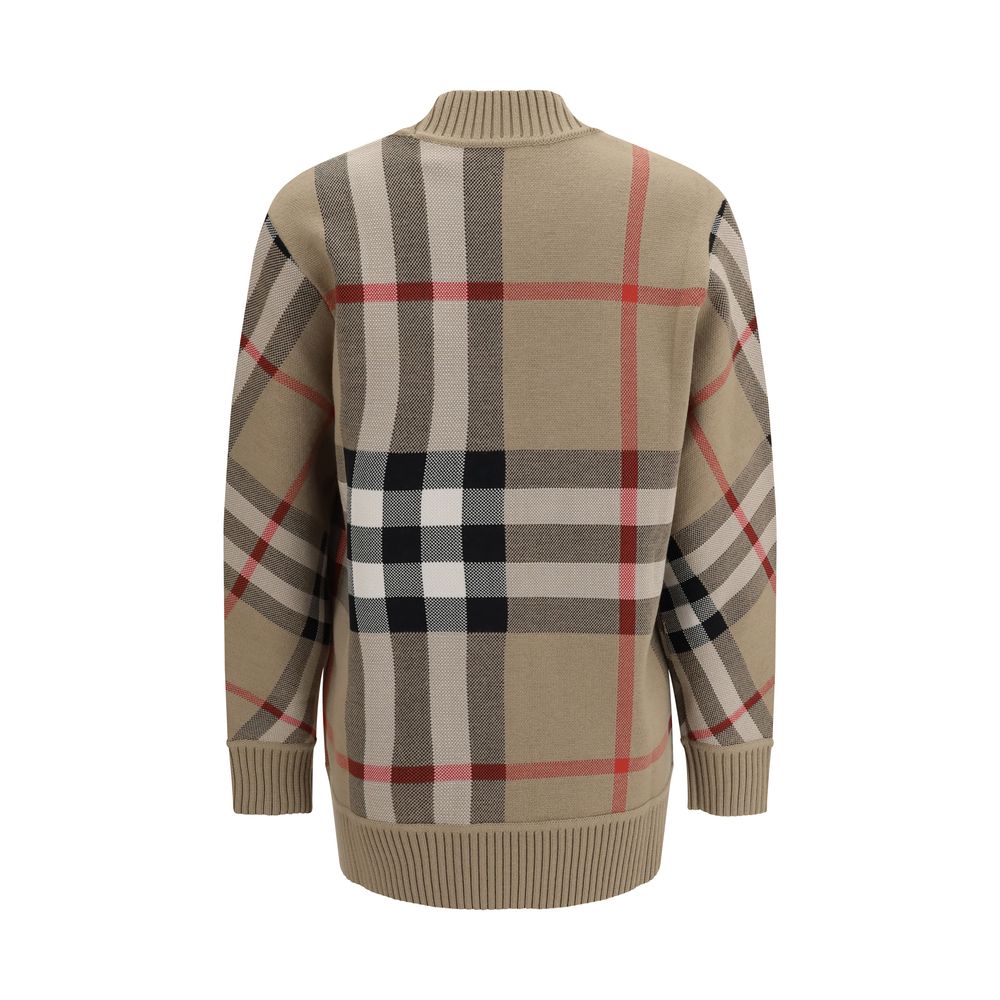 Cardigan by Burberry for women in wool & polyester beige & print features a nuanced silhouette with a refined v-neck neckline and nuanced detailing for a sophisticated look.