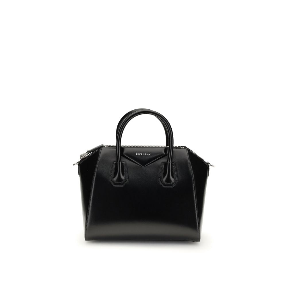 Gym Sports Handbag by Givenchy for women in bos taurus calfskin leather black, gold & signature features a refined silhouette, showcasing a secure , organized , and versatile shoulder-strap & adjustable-strap for a refined finish.