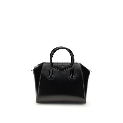 Gym Sports Handbag by Givenchy for women in bos taurus calfskin leather black, gold & signature features a refined silhouette, showcasing a secure , organized , and versatile shoulder-strap & adjustable-strap for a refined finish.