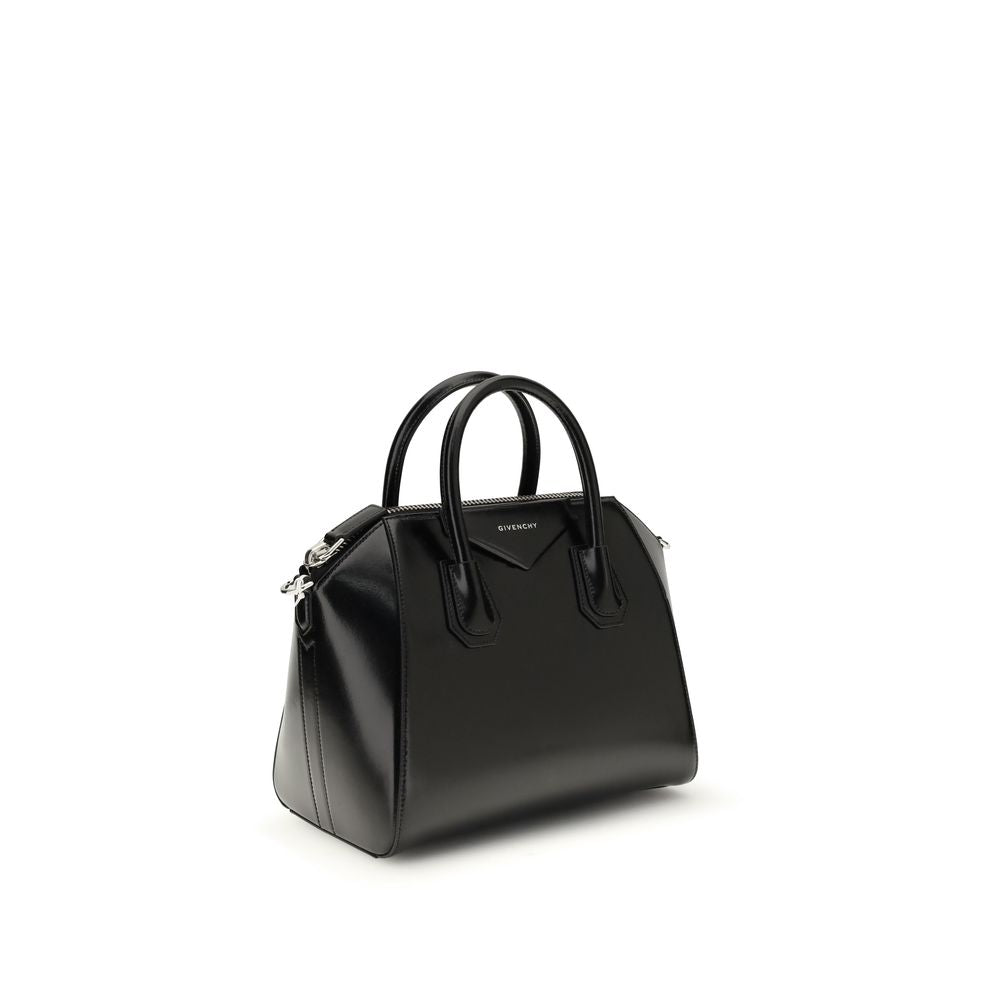 Gym Sports Handbag by Givenchy for women in bos taurus calfskin leather black, gold & signature features an refined silhouette, showcasing a secure , ample , and versatile shoulder-strap & adjustable-strap for a sophisticated refined aesthetic.