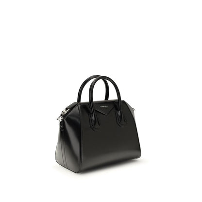 Gym Sports Handbag by Givenchy for women in bos taurus calfskin leather black, gold & signature features an refined silhouette, showcasing a secure , ample , and versatile shoulder-strap & adjustable-strap for a sophisticated refined aesthetic.