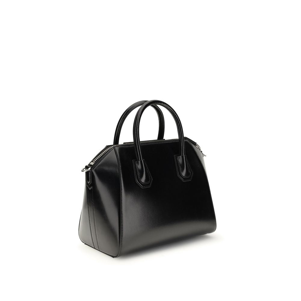 Gym Sports Handbag by Givenchy for women in bos taurus calfskin leather black, gold & signature features a contemporary silhouette, showcasing a secure , ample , and contemporary shoulder-strap & adjustable-strap for a sophisticated look.