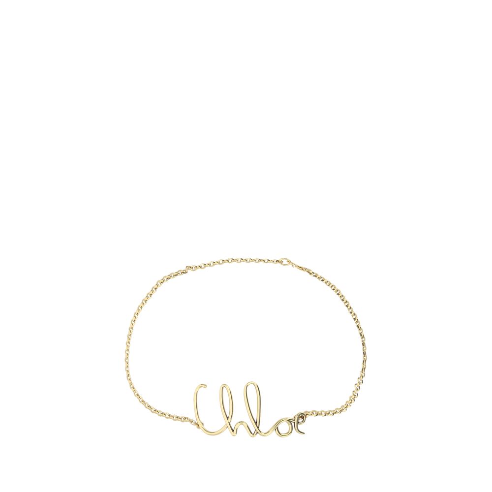 Belt by Chloé for women in brass gold, patterned & monogram features a bohemian chic silhouette, showcasing the bohemian chic Brass Belt design with a sophisticated bohemian chic finish.