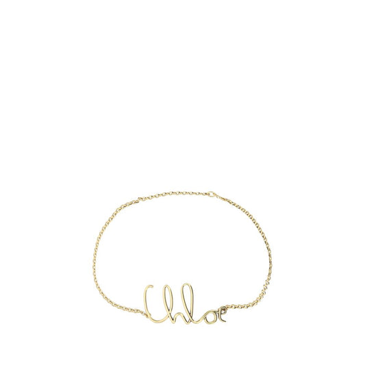Belt by Chloé for women in brass gold, patterned & monogram features a bohemian chic silhouette, showcasing the bohemian chic Brass Belt design with a sophisticated bohemian chic finish.