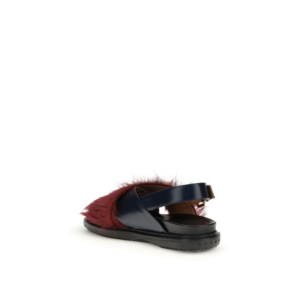 Flat Sandals by Marni for women in bost taurus calfskin leather & fur and multicolor presents a captivating silhouette, showcasing the signature style of the Women's Bost Taurus Calfskin Leather & Fur Flat Sandals with a captivating flat and captivating .