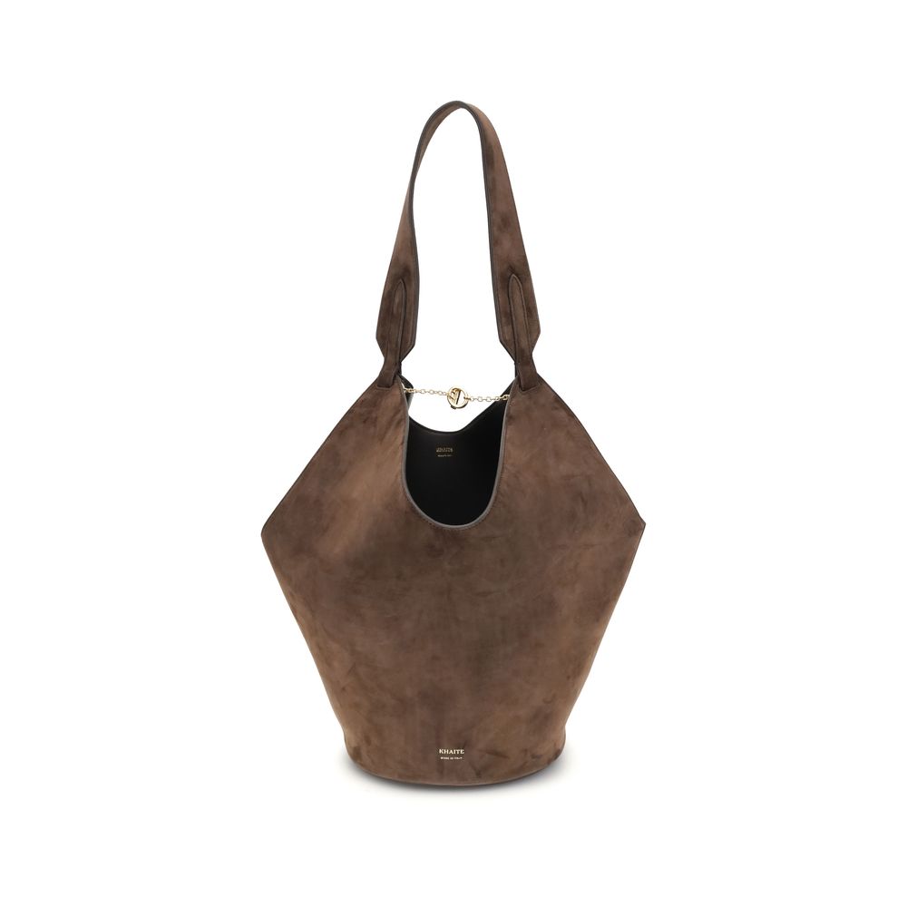 Small Shoulder Bag by Khaite for women in bos taurus calf suede leather brown & monogram features a distinguished silhouette, showcasing a secure and distinguished with versatile shoulder-strap & handle for a distinguished finish.