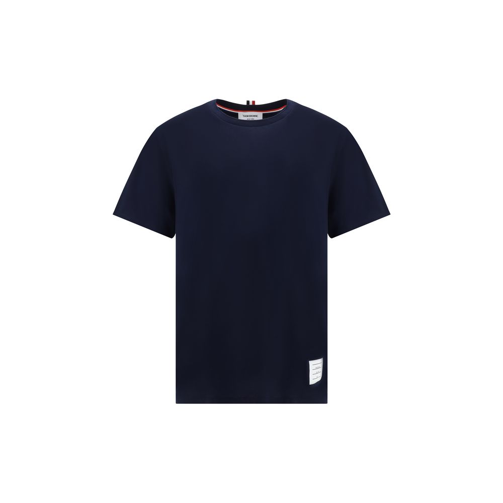 T-Shirt by Thom Browne for men in cotton blue & monogram showcases a unassuming silhouette, artfully detailed with a refined crew neckline and unassuming for a sophisticated, contemporary look.