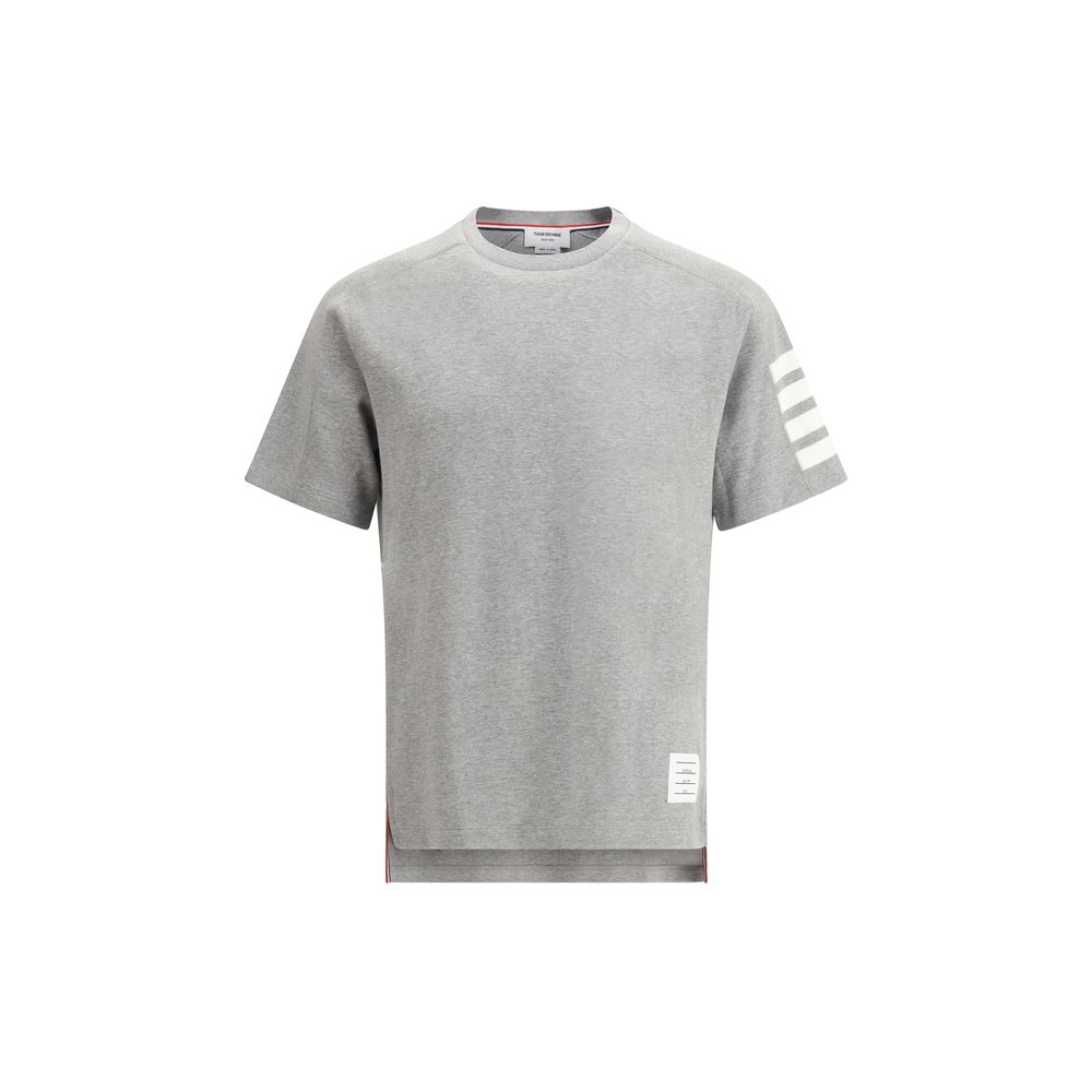 T-Shirt by Thom Browne for men in cotton gray, monogram & striped showcases a dramatic silhouette, elegantly detailed with a dramatic crew neckline and for a truly dramatic finish.