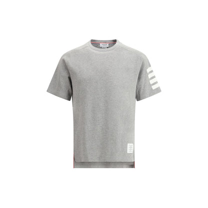 T-Shirt by Thom Browne for men in cotton gray, monogram & striped showcases a dramatic silhouette, elegantly detailed with a dramatic crew neckline and for a truly dramatic finish.