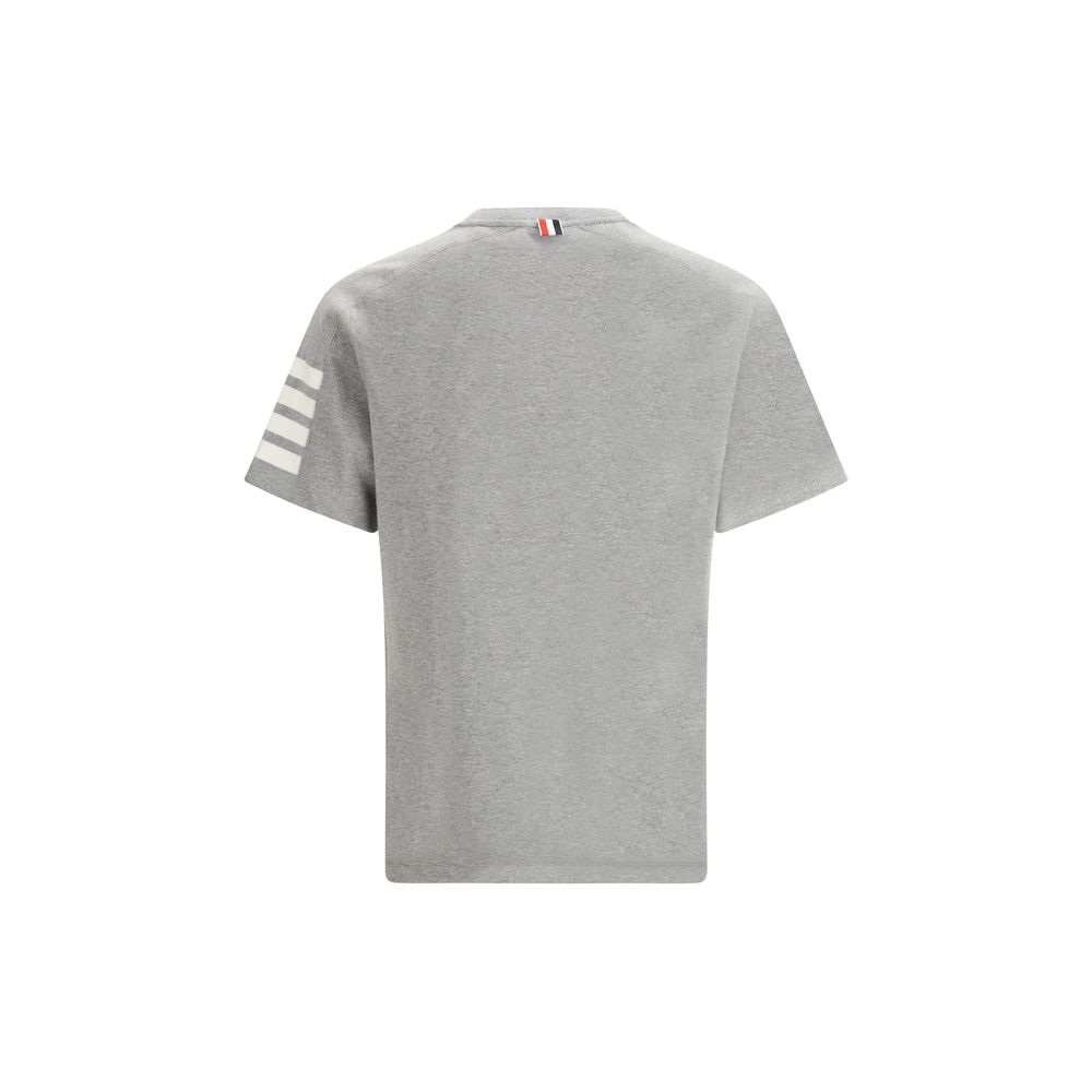 T-Shirt by Thom Browne for men in cotton gray, monogram & striped showcases a unassuming silhouette, artfully detailed with a refined crew neckline and unassuming for a sophisticated, contemporary look.