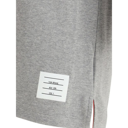 T-Shirt by Thom Browne for men in cotton gray, monogram & striped showcases a fashionable silhouette, elegantly detailed with a fashionable and for a sophisticated, high-fashion look.