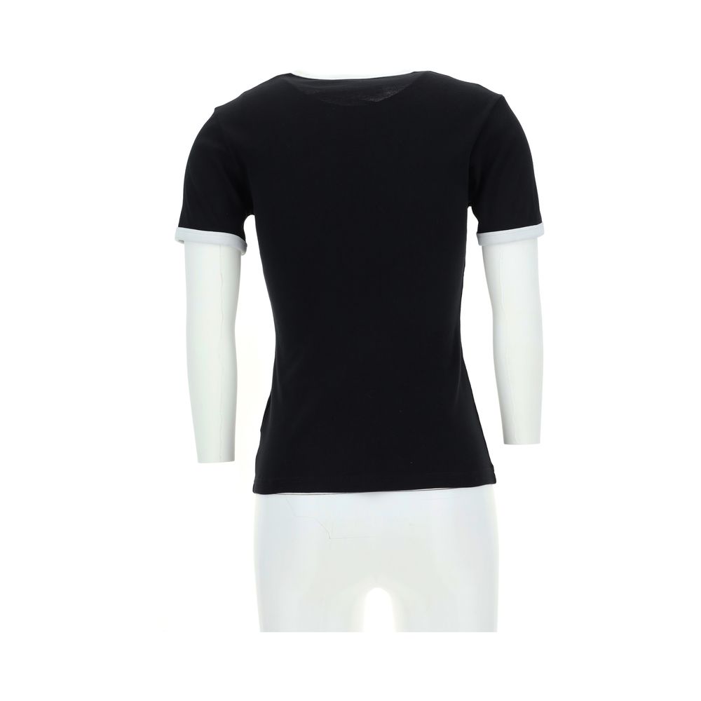 T-Shirt by Courrèges for women in cotton black showcases a chic silhouette, artfully detailed with a chic crew neckline and for a chic finish.